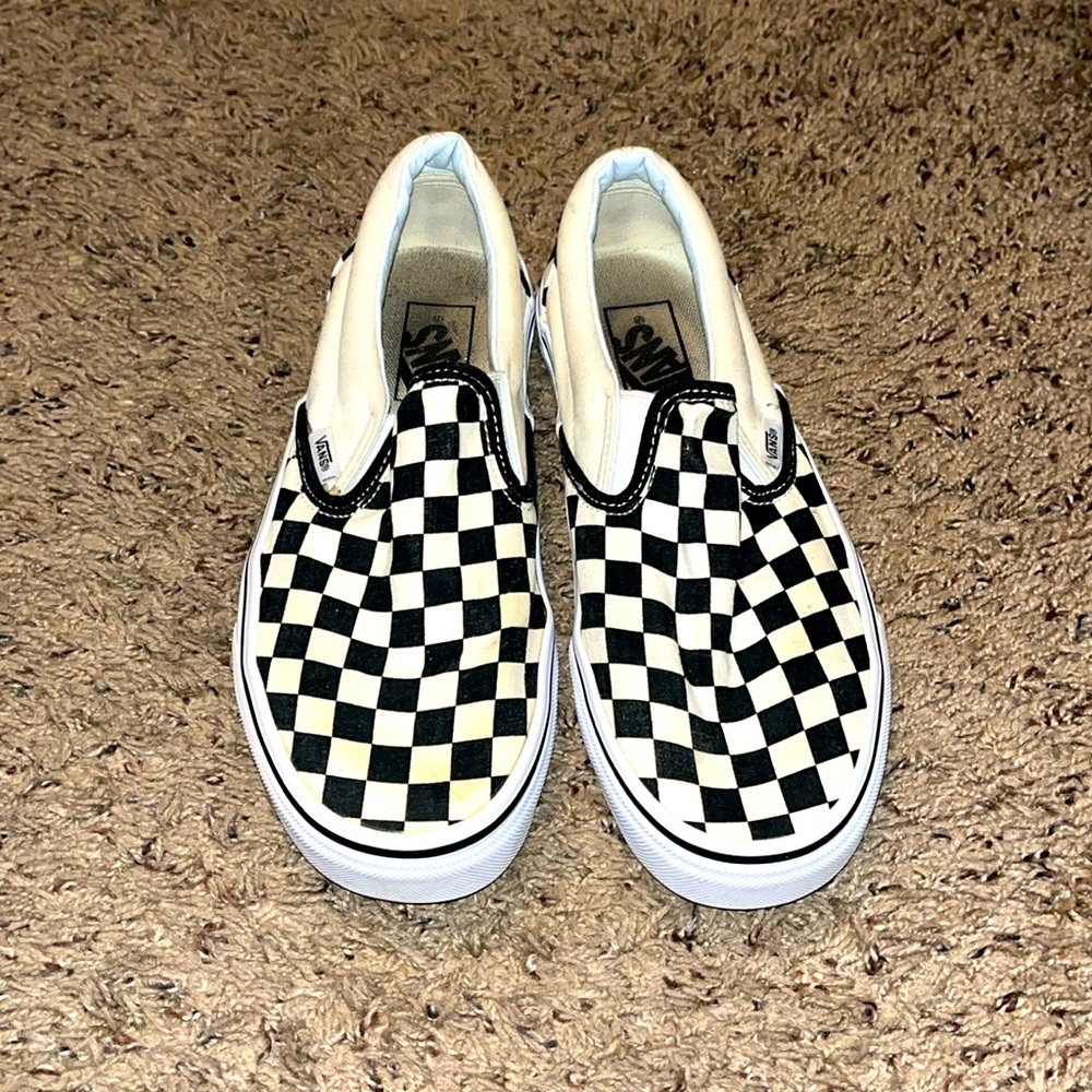 Women’s 8.5 black & white checkered Vans, used but great condition.
